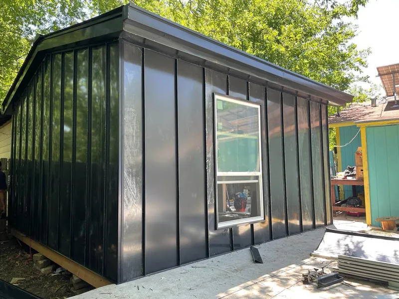 Black standing seam metal wall panels for Metal Roof Installation in Eunice